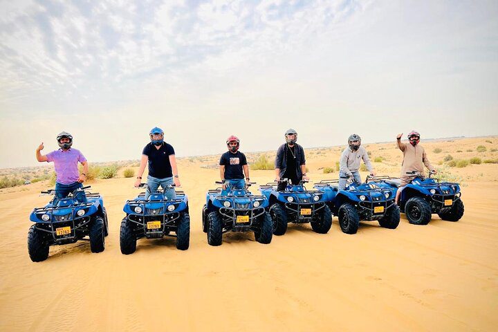 Short Desert Tour with Quad Bike Camel Ride Sandboard & Sunset