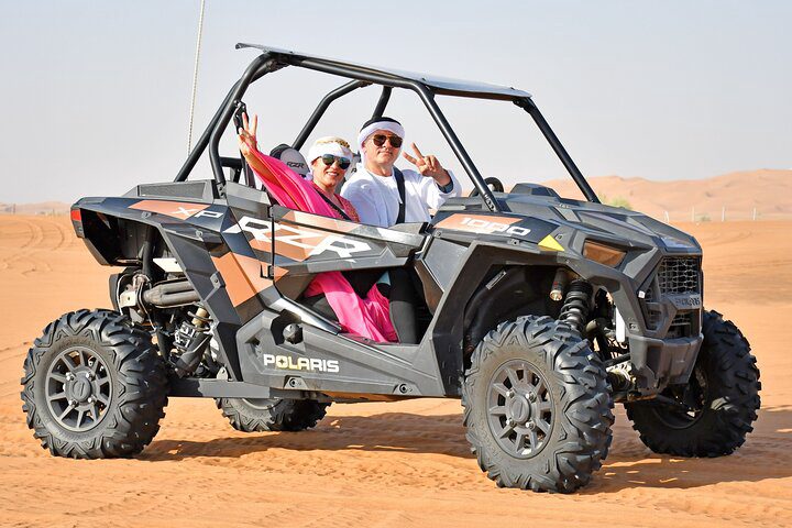 Premium Desert Safari Dune Buggy Camel Ride Sandboard & BBQDinner