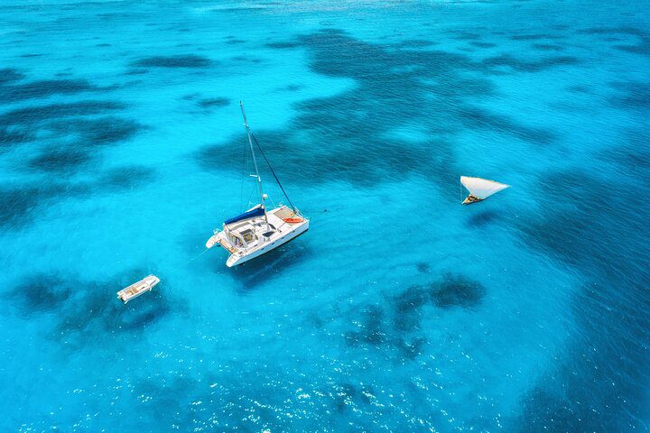 Mnemba Island Private Catamaran Cruise. Lunch & Open Bar